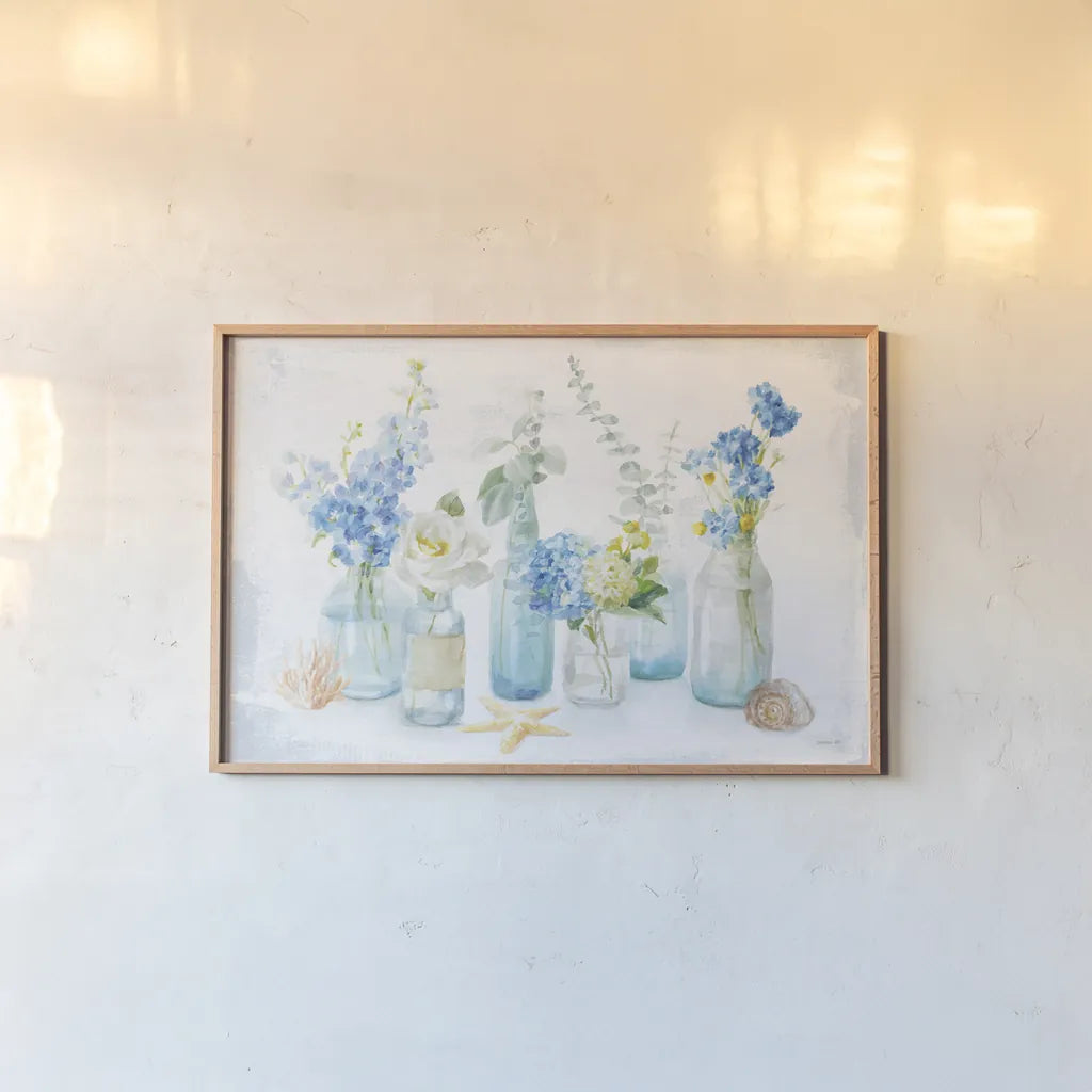 Beach Cottage Florals I by Danhui Nai. shown as a paper print in a natural frame. Available as a archival giclee rolled canvas, fine art paper, or poster print. SKU 47119i.