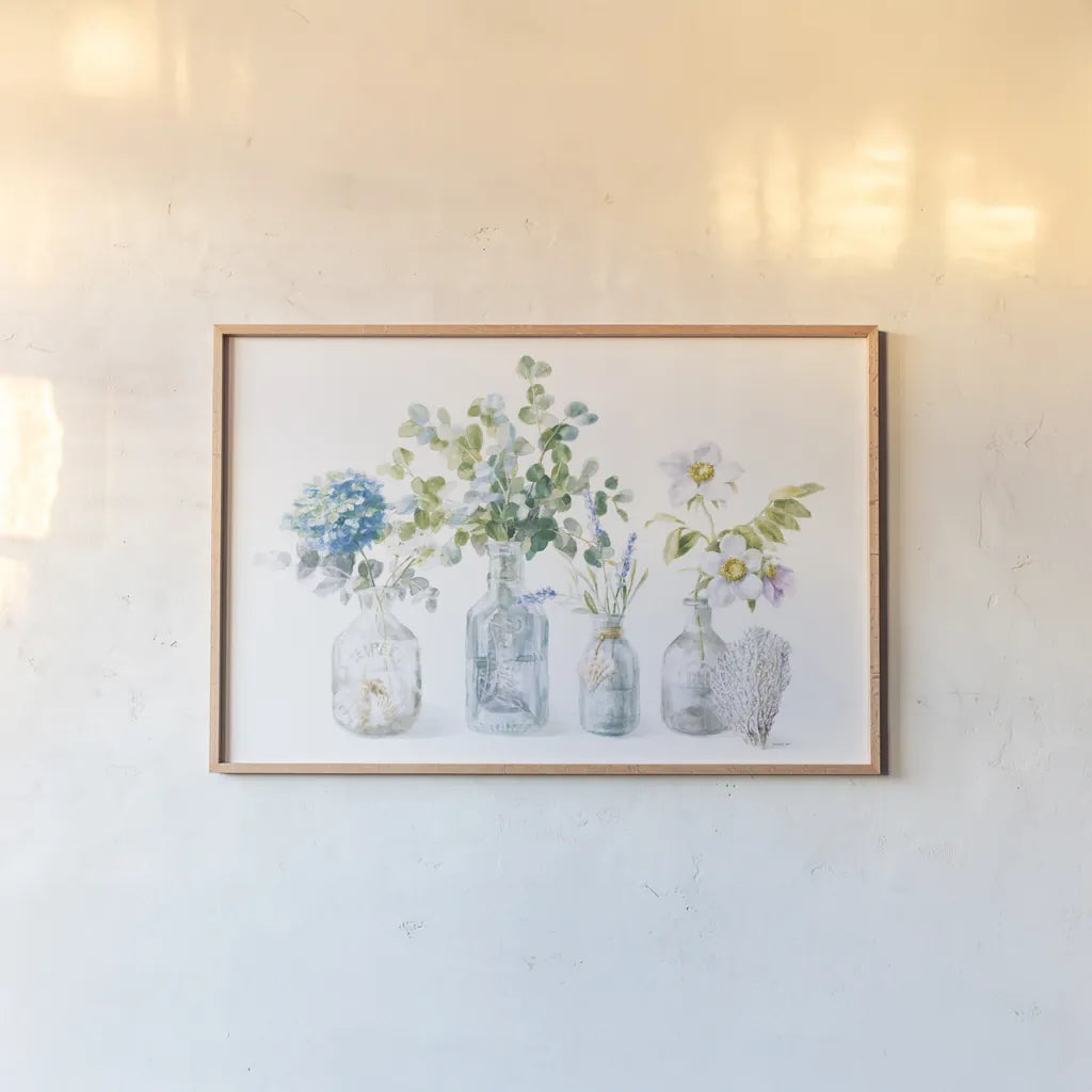 Beach Flowers I by Danhui Nai. shown as a paper print in a natural frame. Available as a archival giclee rolled canvas, fine art paper, or poster print. SKU 44418i.