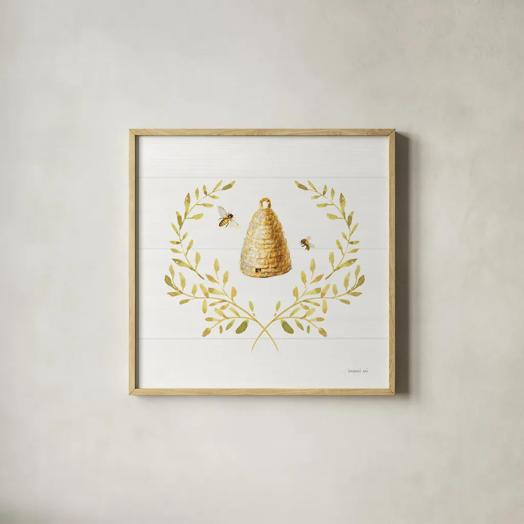 Bees and Blooms Skep Laurel by Danhui Nai. Shown in a natural wood glass frame for a timeless modern aesthetic. Available as an archival giclee rolled canvas, fine art paper, or poster print. SKU 78404a.