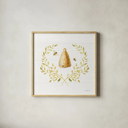 Bees and Blooms Skep Laurel by Danhui Nai. Shown in a natural wood glass frame for a timeless modern aesthetic. Available as an archival giclee rolled canvas, fine art paper, or poster print. SKU 78404a.