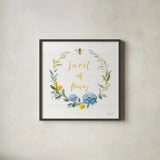 Bees and Blooms_Sweet As Honey Wreath by Danhui Nai. Shown in a sleek black glass frame for a contemporary gallery look. Available as an archival giclee rolled canvas, fine art paper, or poster print. SKU 78406a.