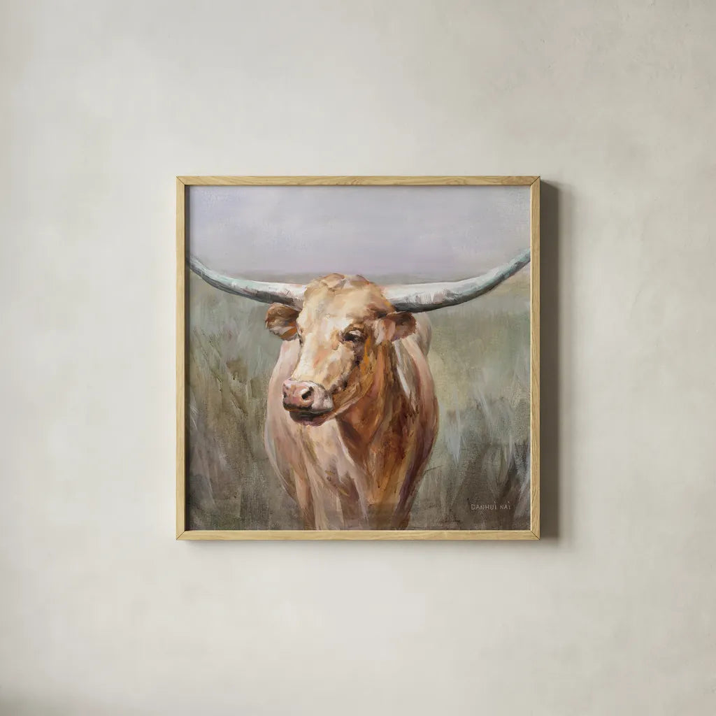 Big Sky Longhorn Crop by Danhui Nai. Shown in a natural wood glass frame for a timeless modern aesthetic. Available as an archival giclee rolled canvas, fine art paper, or poster print. SKU 75633a.