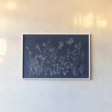 Blue Butterfly Garden by Danhui Nai. shown as a paper print in a white frame. Available as a archival giclee rolled canvas, fine art paper, or poster print. SKU 76348i.