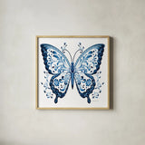 Blue Butterfly I by Danhui Nai. Shown in a natural wood glass frame for a timeless modern aesthetic. Available as an archival giclee rolled canvas, fine art paper, or poster print. SKU 99152a.