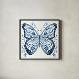 Blue Butterfly II by Danhui Nai. Shown in a sleek black glass frame for a contemporary gallery look. Available as an archival giclee rolled canvas, fine art paper, or poster print. SKU 99153a.