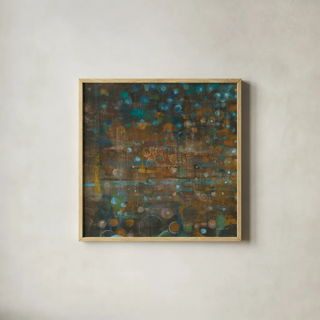 Blue and Bronze Dots IX by Danhui Nai. Shown in a natural wood glass frame for a timeless modern aesthetic. Available as an archival giclee rolled canvas, fine art paper, or poster print. SKU 29771a.