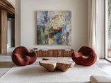 Blue and Sienna Abstract by Danhui Nai. Shown as extra-large giant wall art in a modern living room. Available as an archival giclee rolled canvas, fine art paper, or poster print. SKU 69231a.