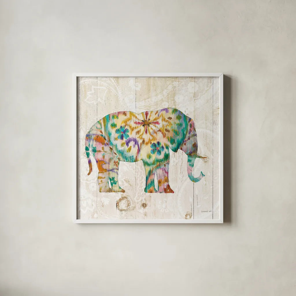 Boho Paisley Elephant I by Danhui Nai. Shown in a crisp white glass frame for a clean and minimalist style. Available as an archival giclee rolled canvas, fine art paper, or poster print. SKU 23980a.