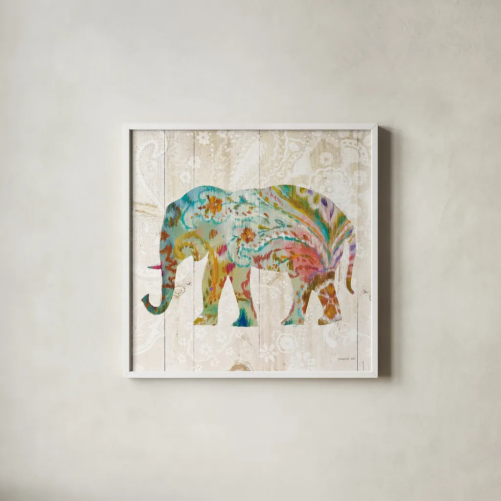 Boho Paisley Elephant II by Danhui Nai. Shown in a crisp white glass frame for a clean and minimalist style. Available as an archival giclee rolled canvas, fine art paper, or poster print. SKU 23981a.