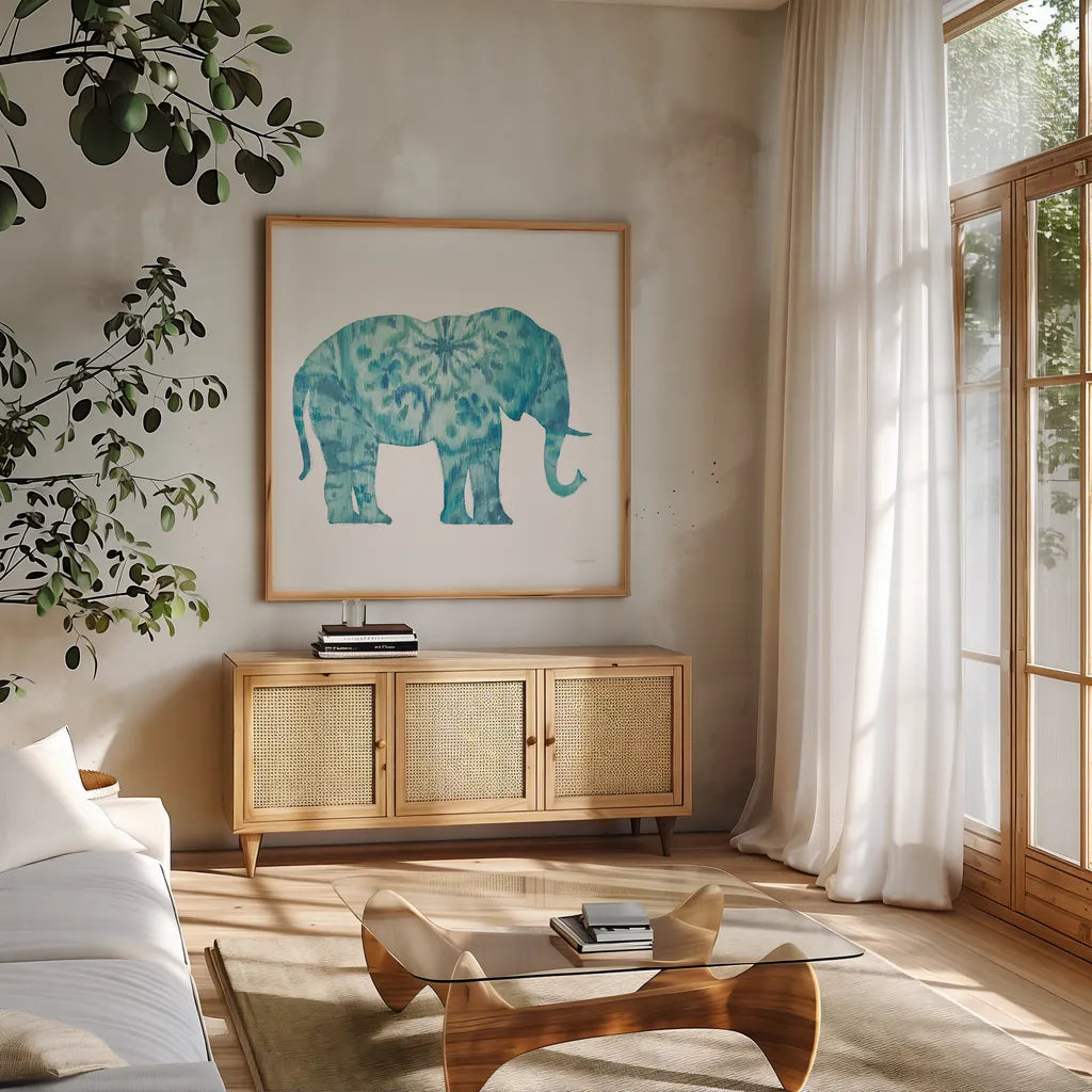 Boho Teal Elephant I by Danhui Nai. Shown in a natural wood frame in a cozy modern living room. Available as an archival giclee rolled canvas, fine art paper, or poster print. SKU 33578a.