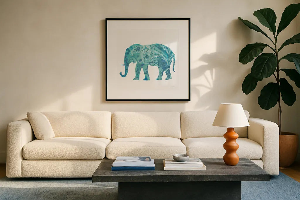 Boho Teal Elephant II by Danhui Nai. Displayed in a glass frame with matte in a clean modern living room. Available as an archival giclee rolled canvas, fine art paper, or poster print. SKU 33579a.