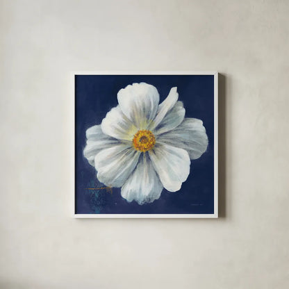 Boldest Bloom I Dark Blue by Danhui Nai. Shown in a crisp white glass frame for a clean and minimalist style. Available as an archival giclee rolled canvas, fine art paper, or poster print. SKU 66621a.