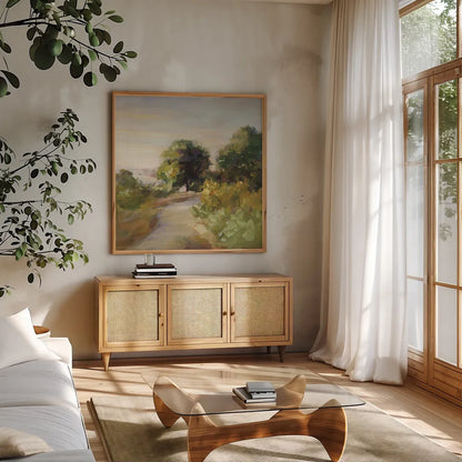 Bright Eucalyptus Trail by Danhui Nai. Shown in a natural wood frame in a cozy modern living room. Available as an archival giclee rolled canvas, fine art paper, or poster print. SKU 68928a.