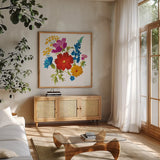 Brilliant Blooms I by Danhui Nai. Shown in a natural wood frame in a cozy modern living room. Available as an archival giclee rolled canvas, fine art paper, or poster print. SKU 90705a.