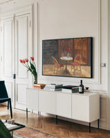 Cafe a Deux by Danhui Nai. shown as a framed stretched canvas in a living room above a console. Available as a archival giclee rolled canvas, fine art paper, or poster print. SKU 12348i.
