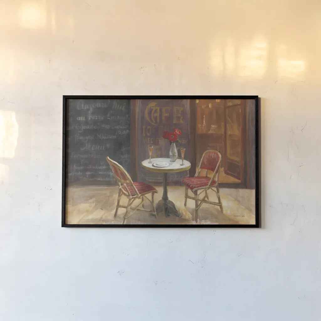 Cafe a Deux by Danhui Nai. shown as a paper print in a black flame. Available as a archival giclee rolled canvas, fine art paper, or poster print. SKU 12348i.