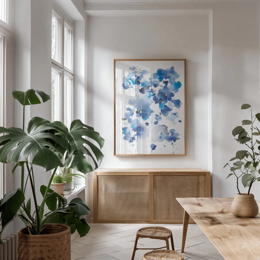 Cascading Petals I by Danhui Nai. shown as a print in a natural wood frame in a dining room. Available as a archival giclee rolled canvas, fine art paper, or poster print. SKU 68221h.
