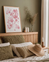 Cascading Petals I Pink by Danhui Nai. shown as a paper print in a natural frame. Available as a archival giclee rolled canvas, fine art paper, or poster print. SKU 74158h.