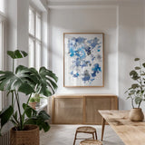 Cascading Petals II by Danhui Nai. shown as a print in a natural wood frame in a dining room. Available as a archival giclee rolled canvas, fine art paper, or poster print. SKU 68222h.