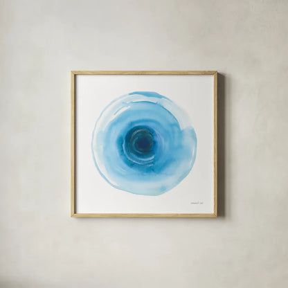 Center of Blue I by Danhui Nai. Shown in a natural wood glass frame for a timeless modern aesthetic. Available as an archival giclee rolled canvas, fine art paper, or poster print. SKU 76093a.