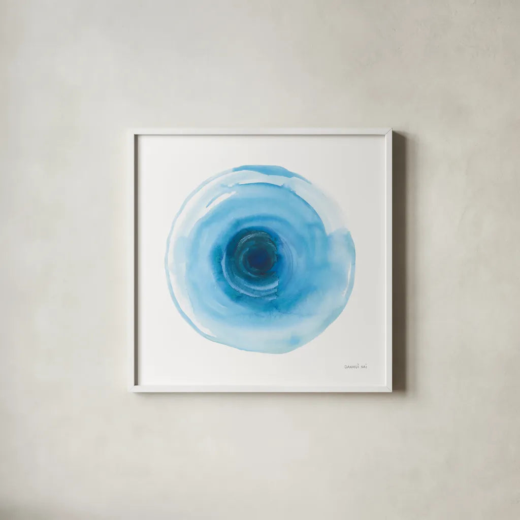 Center of Blue I by Danhui Nai. Shown in a crisp white glass frame for a clean and minimalist style. Available as an archival giclee rolled canvas, fine art paper, or poster print. SKU 76093a.