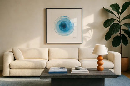 Center of Blue I by Danhui Nai. Displayed in a glass frame with matte in a clean modern living room. Available as an archival giclee rolled canvas, fine art paper, or poster print. SKU 76093a.