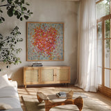 Circle of Hearts by Danhui Nai. Shown in a natural wood frame in a cozy modern living room. Available as an archival giclee rolled canvas, fine art paper, or poster print. SKU 34626a.