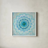 Coastal Mandala by Danhui Nai. Shown in a crisp white glass frame for a clean and minimalist style. Available as an archival giclee rolled canvas, fine art paper, or poster print. SKU 46624a.