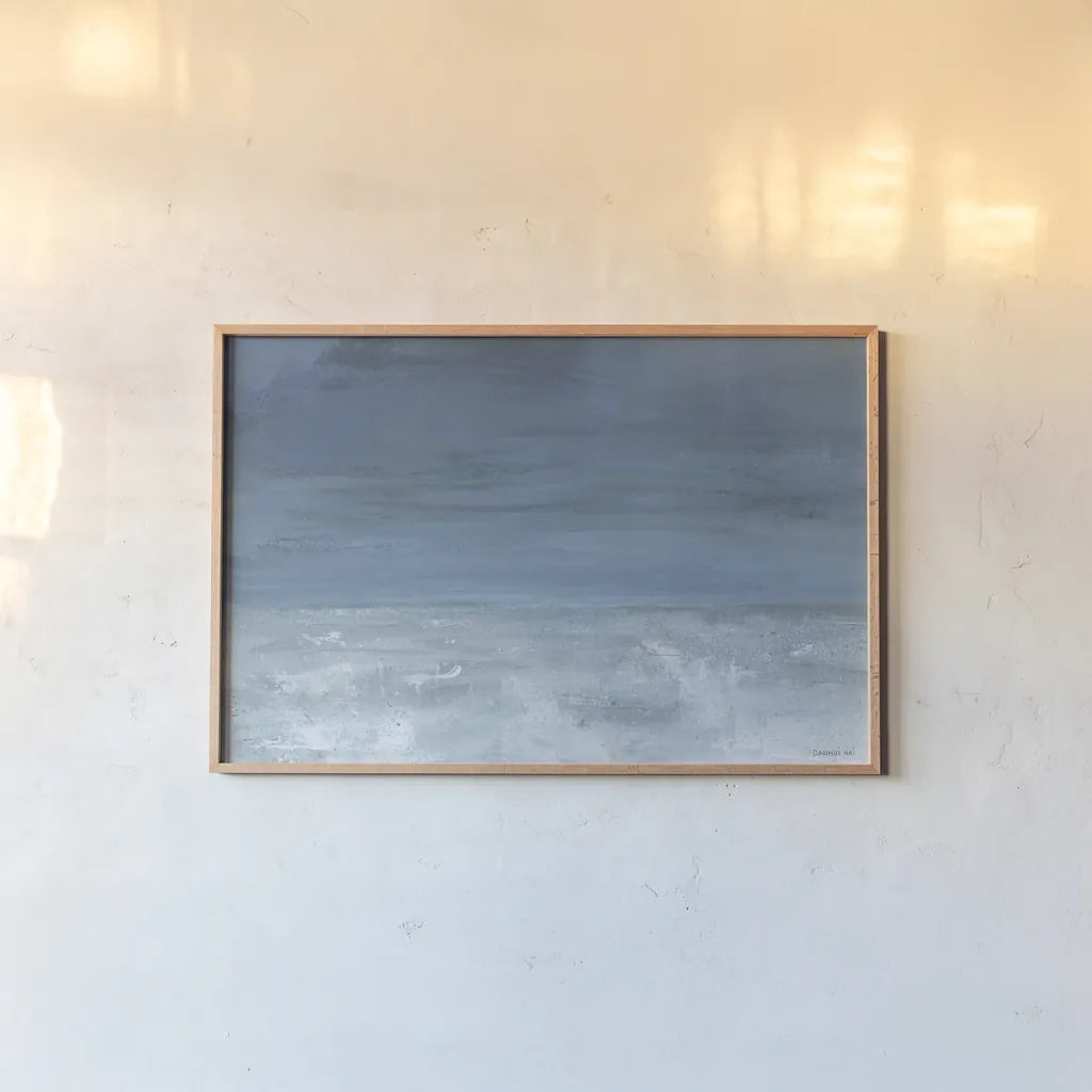 Coastal Mood by Danhui Nai. shown as a paper print in a natural frame. Available as a archival giclee rolled canvas, fine art paper, or poster print. SKU 99341i.