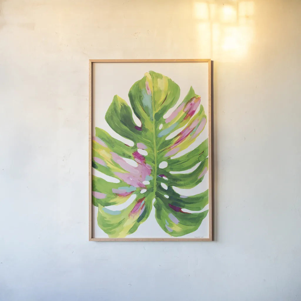 Colorful Tropical Leaf I by Danhui Nai. shown as a paper print in a natural frame. Available as a archival giclee rolled canvas, fine art paper, or poster print. SKU 92262h.