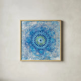 Concentric Mandala Blue by Danhui Nai. Shown in a natural wood glass frame for a timeless modern aesthetic. Available as an archival giclee rolled canvas, fine art paper, or poster print. SKU 88714a.