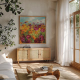 Cosmos in the Field Purple by Danhui Nai. Shown in a natural wood frame in a cozy modern living room. Available as an archival giclee rolled canvas, fine art paper, or poster print. SKU 11909a.