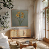 Cottage Daffodil by Danhui Nai. Shown in a natural wood frame in a cozy modern living room. Available as an archival giclee rolled canvas, fine art paper, or poster print. SKU 91988a.