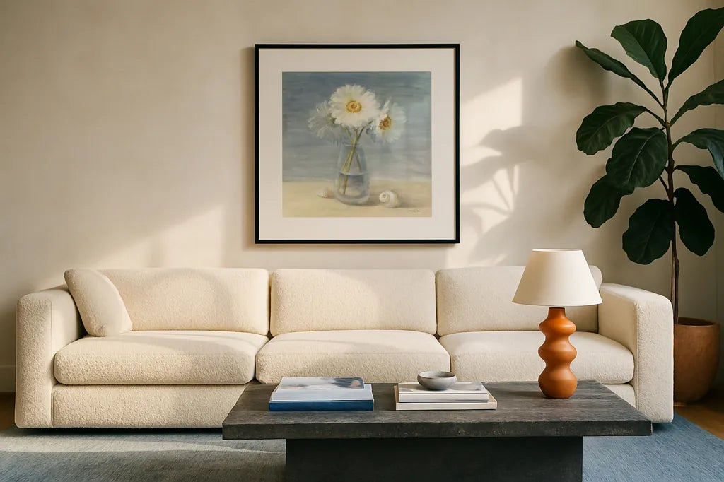 Daisies and Shells by Danhui Nai. Displayed in a glass frame with matte in a clean modern living room. Available as an archival giclee rolled canvas, fine art paper, or poster print. SKU 2902a.