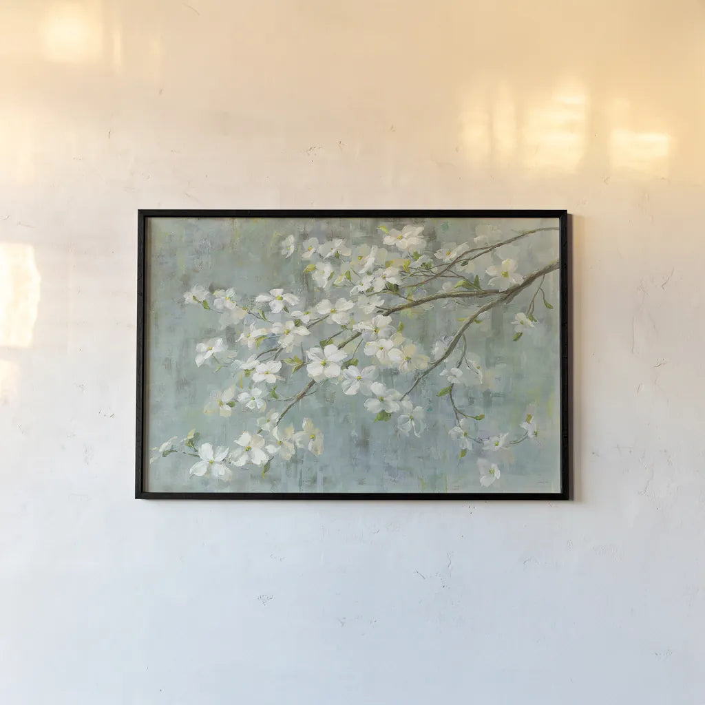 Dogwood in Spring on Blue by Danhui Nai. shown as a paper print in a black flame. Available as a archival giclee rolled canvas, fine art paper, or poster print. SKU 28719i.