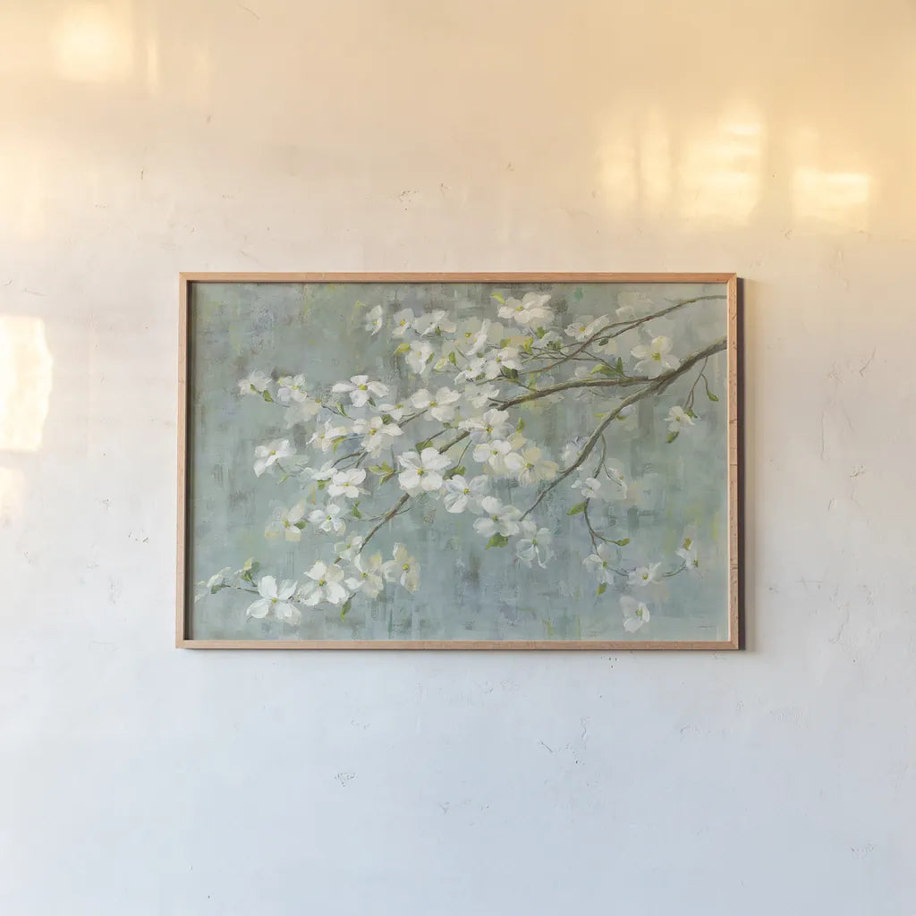 Dogwood in Spring on Blue by Danhui Nai. shown as a paper print in a natural frame. Available as a archival giclee rolled canvas, fine art paper, or poster print. SKU 28719i.