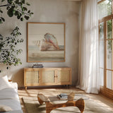 Driftwood Shell IV by Danhui Nai. Shown in a natural wood frame in a cozy modern living room. Available as an archival giclee rolled canvas, fine art paper, or poster print. SKU 66978a.