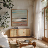 Earth by Danhui Nai. Shown in a natural wood frame in a cozy modern living room. Available as an archival giclee rolled canvas, fine art paper, or poster print. SKU 79293a.