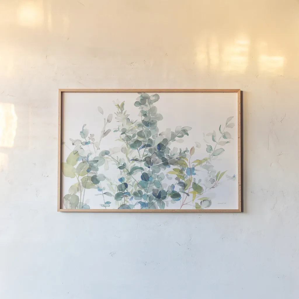 Eucalyptus I White Crop by Danhui Nai. shown as a paper print in a natural frame. Available as a archival giclee rolled canvas, fine art paper, or poster print. SKU 35489i.