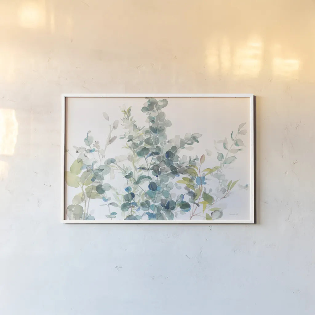 Eucalyptus I White Crop by Danhui Nai. shown as a paper print in a white frame. Available as a archival giclee rolled canvas, fine art paper, or poster print. SKU 35489i.