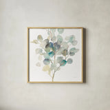 Eucalyptus III White Crop by Danhui Nai. Shown in a natural wood glass frame for a timeless modern aesthetic. Available as an archival giclee rolled canvas, fine art paper, or poster print. SKU 35491a.
