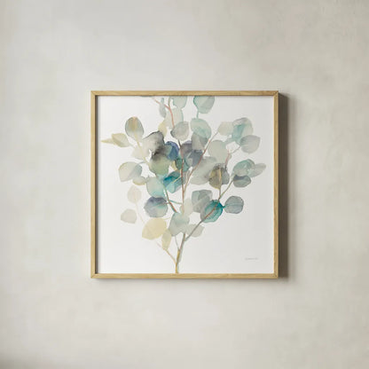 Eucalyptus III White Crop by Danhui Nai. Shown in a natural wood glass frame for a timeless modern aesthetic. Available as an archival giclee rolled canvas, fine art paper, or poster print. SKU 35491a.