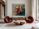 Fall Bouquet Orange Rose by Danhui Nai. Shown as extra-large giant wall art in a modern living room. Available as an archival giclee rolled canvas, fine art paper, or poster print. SKU 42828a.
