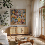 Fall Confetti Leaves by Danhui Nai. Shown in a natural wood frame in a cozy modern living room. Available as an archival giclee rolled canvas, fine art paper, or poster print. SKU 81859a.