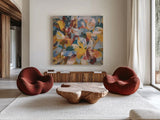 Fall Confetti Leaves by Danhui Nai. Shown as extra-large giant wall art in a modern living room. Available as an archival giclee rolled canvas, fine art paper, or poster print. SKU 81859a.