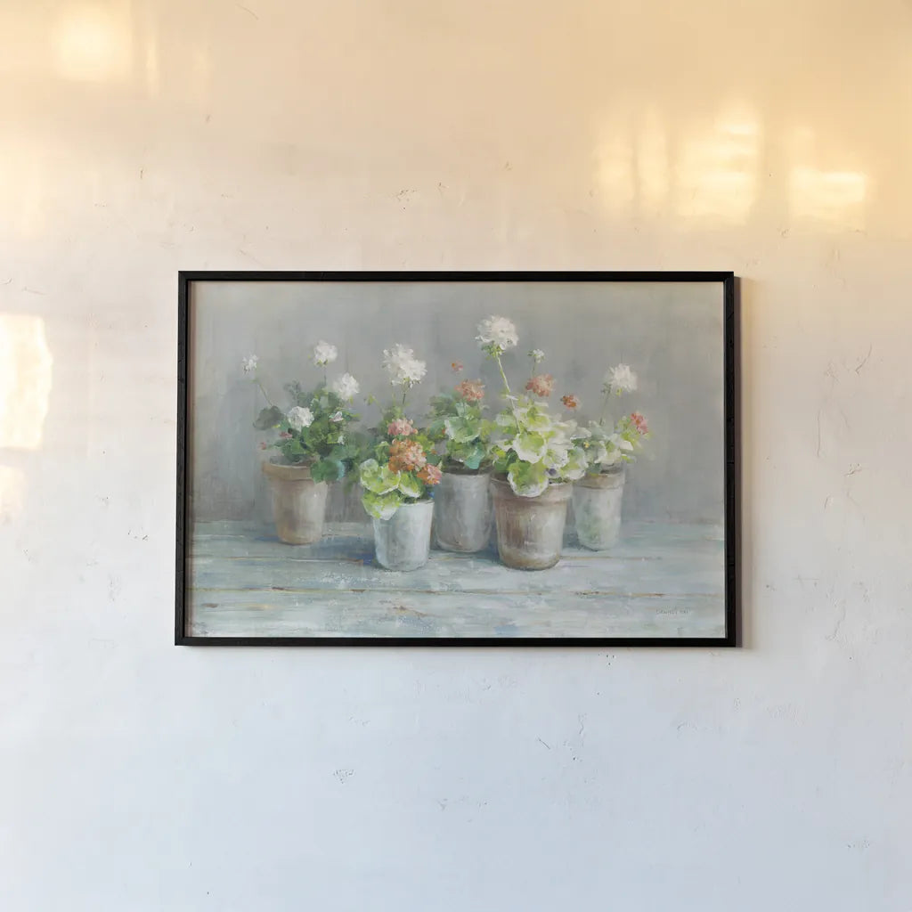 Farmhouse Geraniums by Danhui Nai. shown as a paper print in a black flame. Available as a archival giclee rolled canvas, fine art paper, or poster print. SKU 61292i.