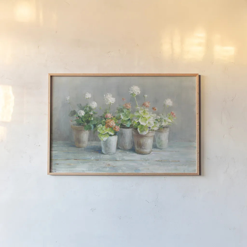 Farmhouse Geraniums by Danhui Nai. shown as a paper print in a natural frame. Available as a archival giclee rolled canvas, fine art paper, or poster print. SKU 61292i.