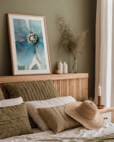 Feeling Blue II by Danhui Nai. shown as a paper print in a natural frame. Available as a archival giclee rolled canvas, fine art paper, or poster print. SKU 94184h.