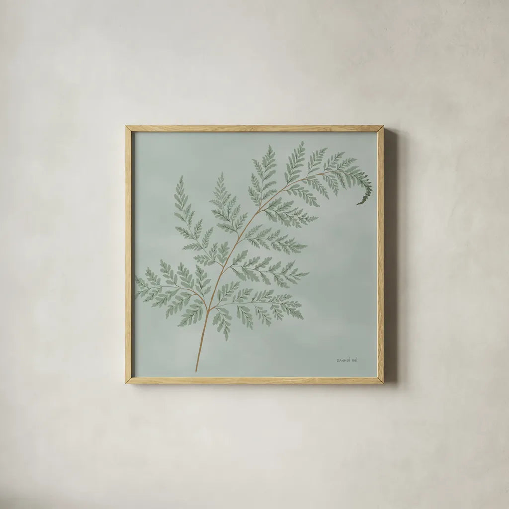 Fern I by Danhui Nai. Shown in a natural wood glass frame for a timeless modern aesthetic. Available as an archival giclee rolled canvas, fine art paper, or poster print. SKU 84102a.