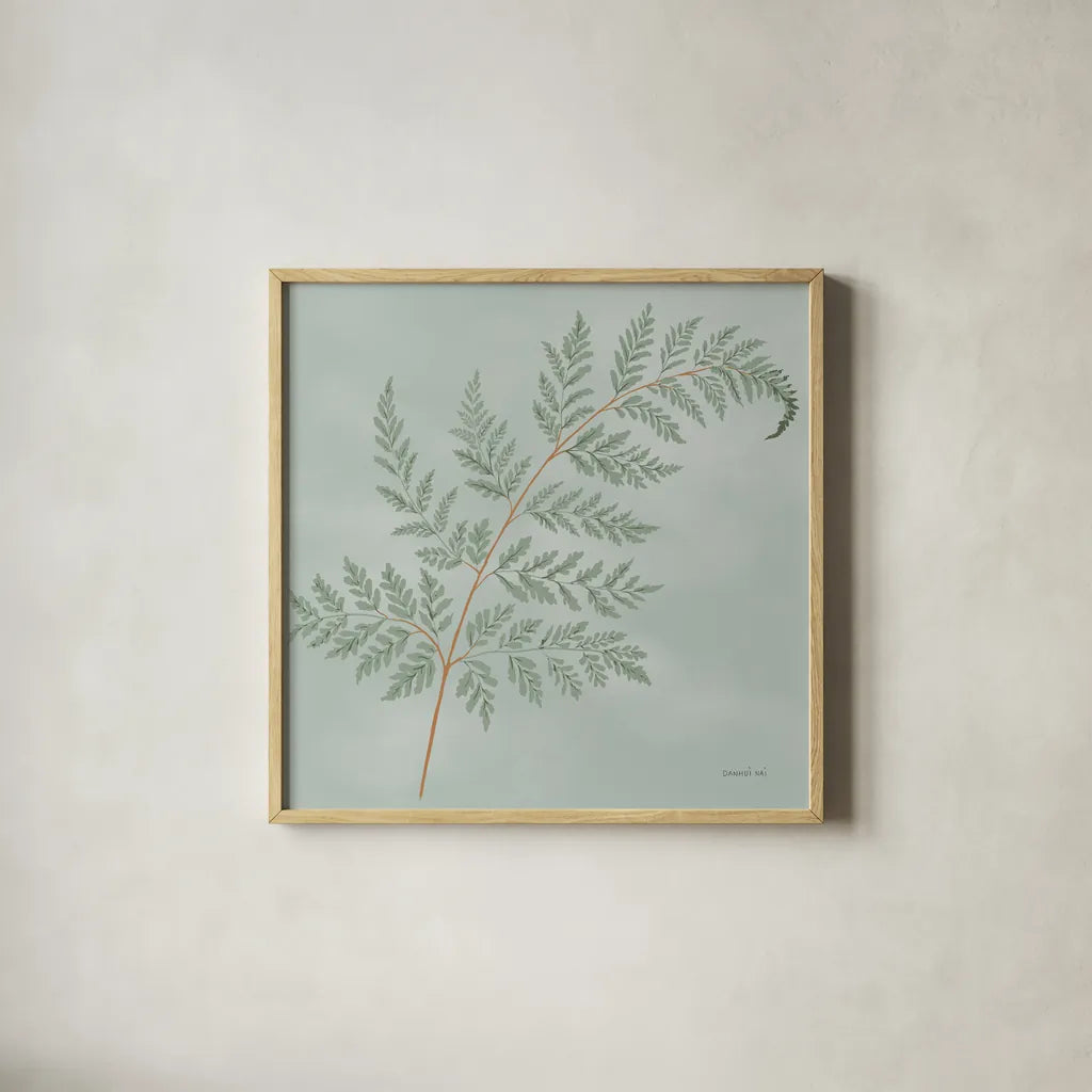 Fern I with Orange by Danhui Nai. Shown in a natural wood glass frame for a timeless modern aesthetic. Available as an archival giclee rolled canvas, fine art paper, or poster print. SKU 86268a.